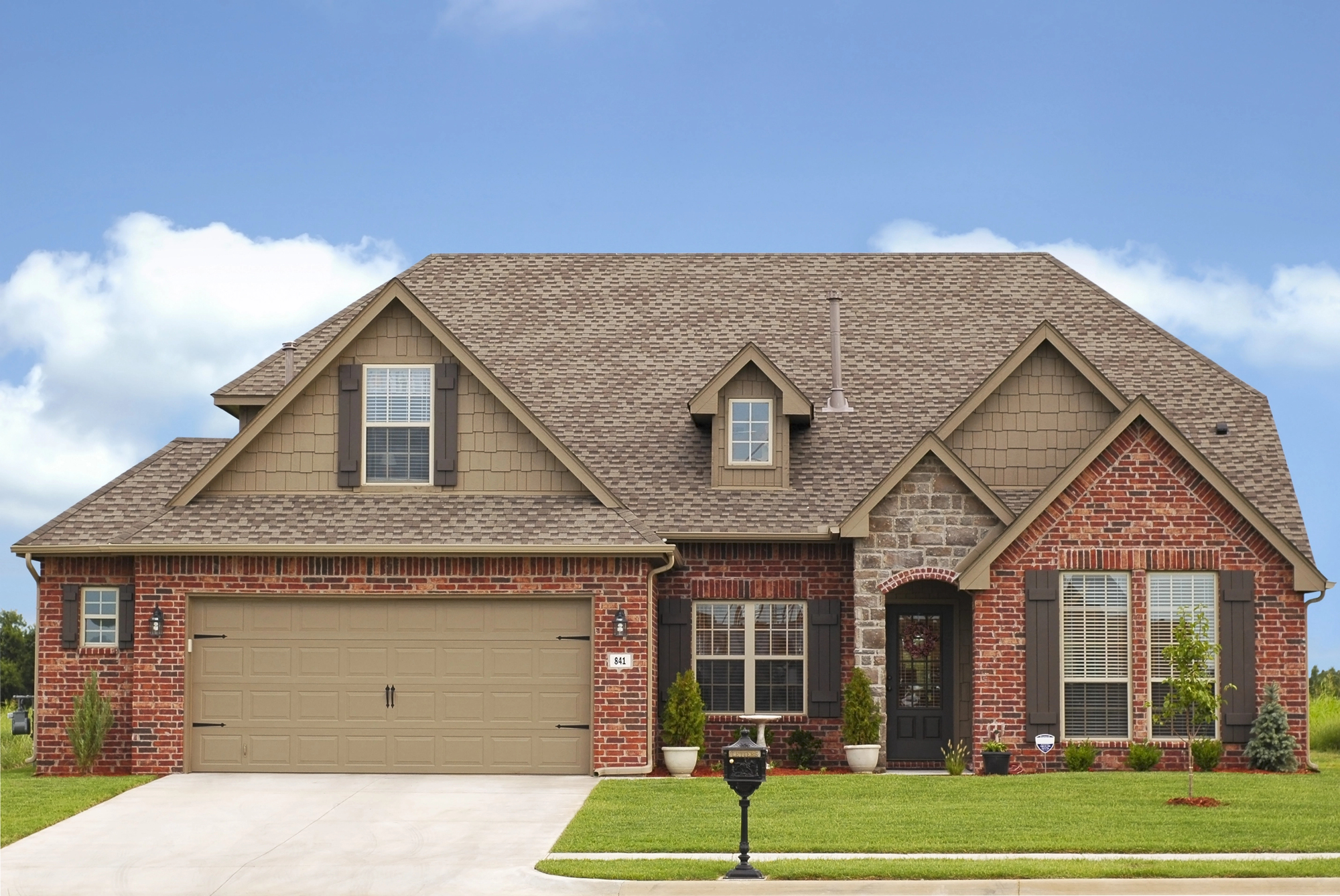 does a new garage door increase home value