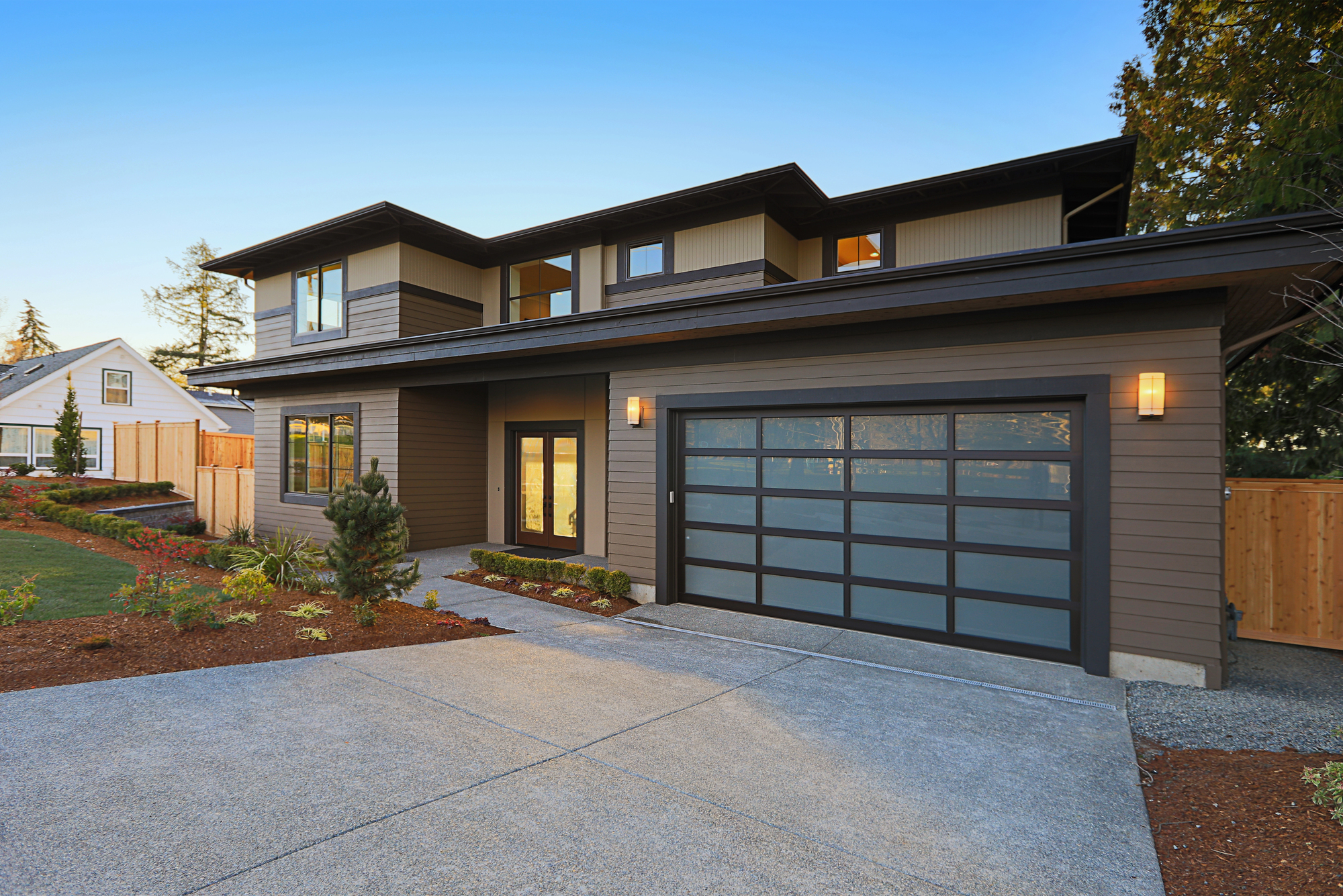 does a new garage door increase home value
